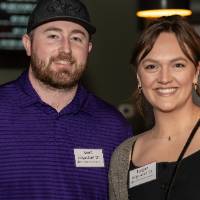 Scott and Teagan Hilgerdorf standing and smiling at camera
